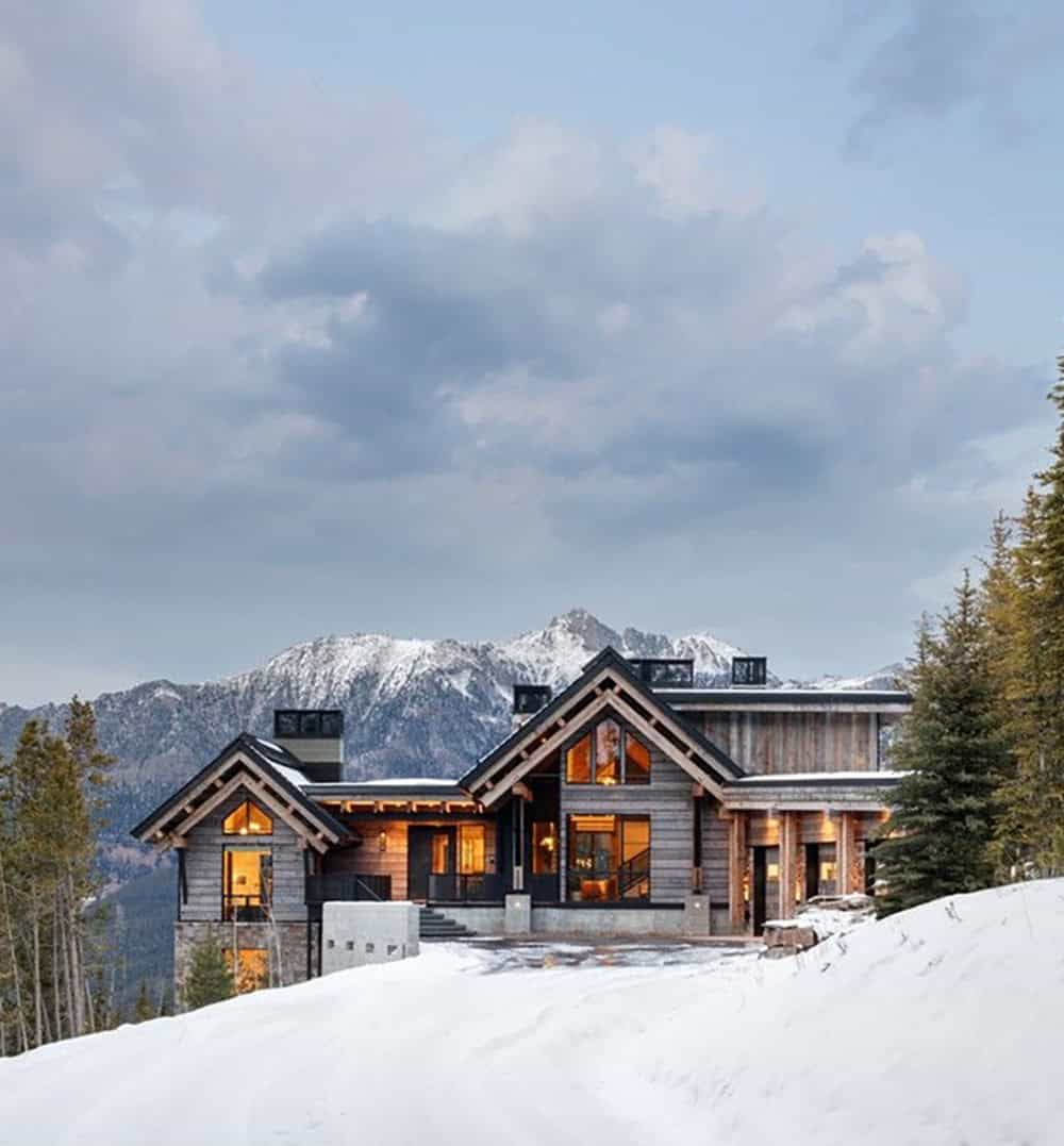 contemporary mountain house exterior with snow