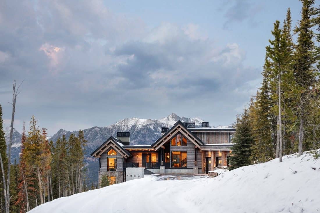 contemporary mountain house exterior with snow
