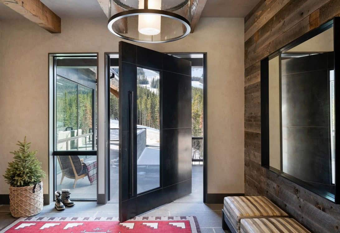 contemporary mountain house entry with a bench