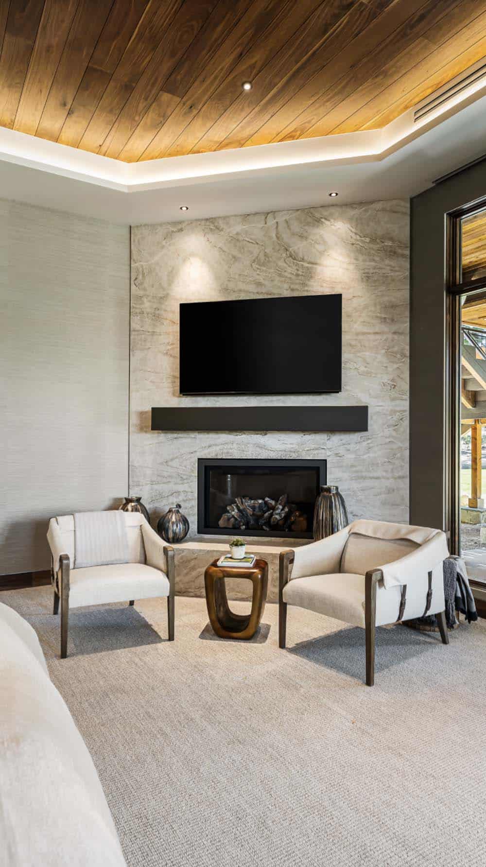 Contemporary Bedroom with a Fireplace