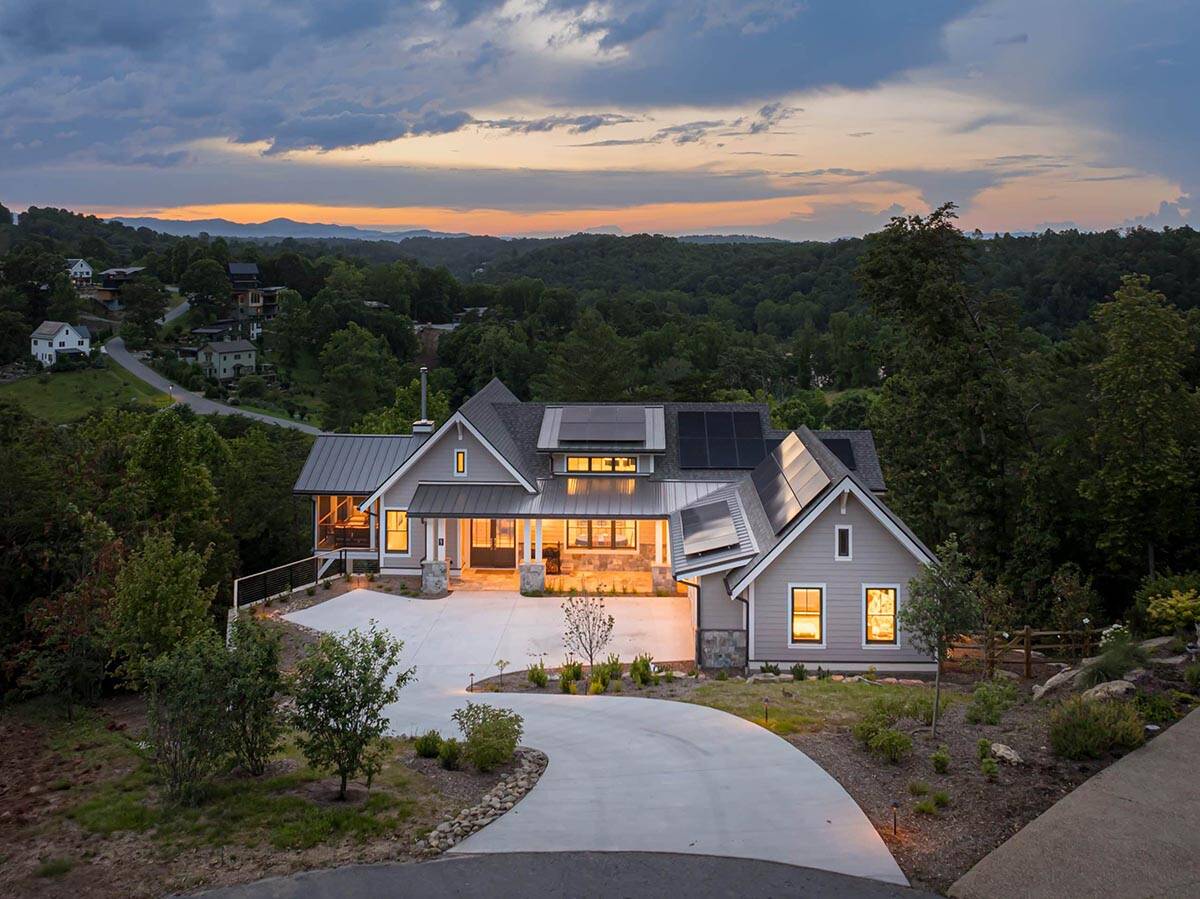 mountain modern home exterior at dusk