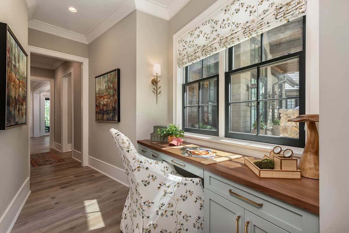 contemporary hallway with a built-in desk and chair
