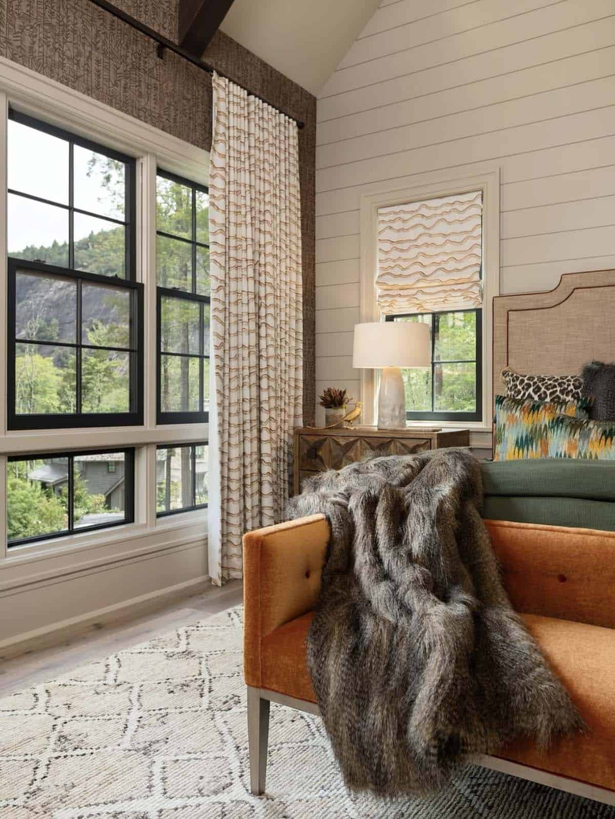 contemporary bedroom with a large window