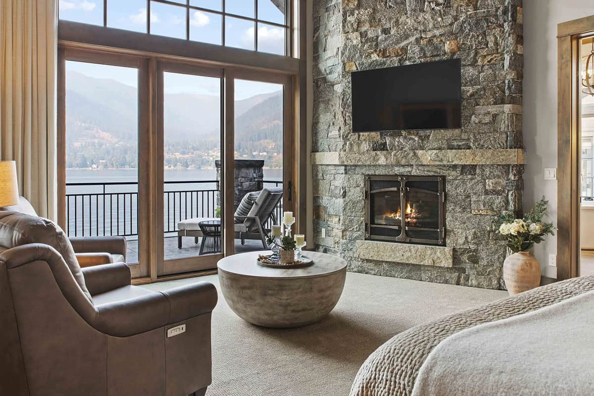 contemporary bedroom with a fireplace