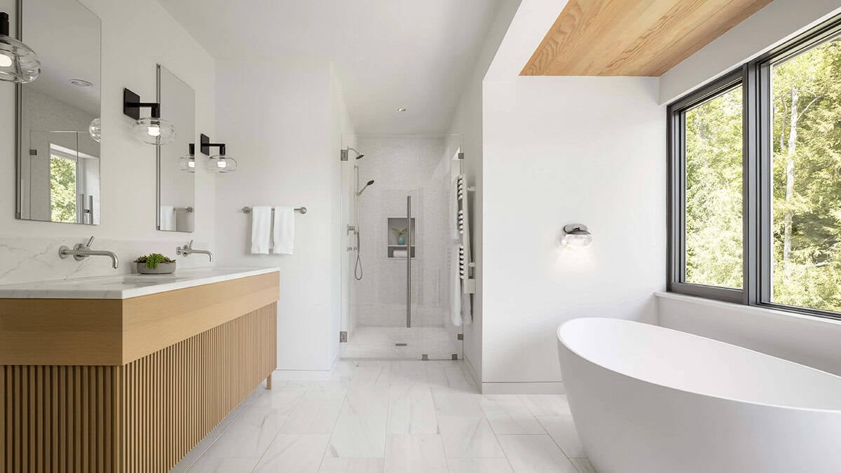 contemporary with a large vanity, shower and freestanding tub