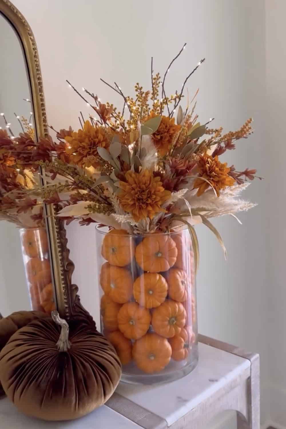 mini pumpkins in a vase