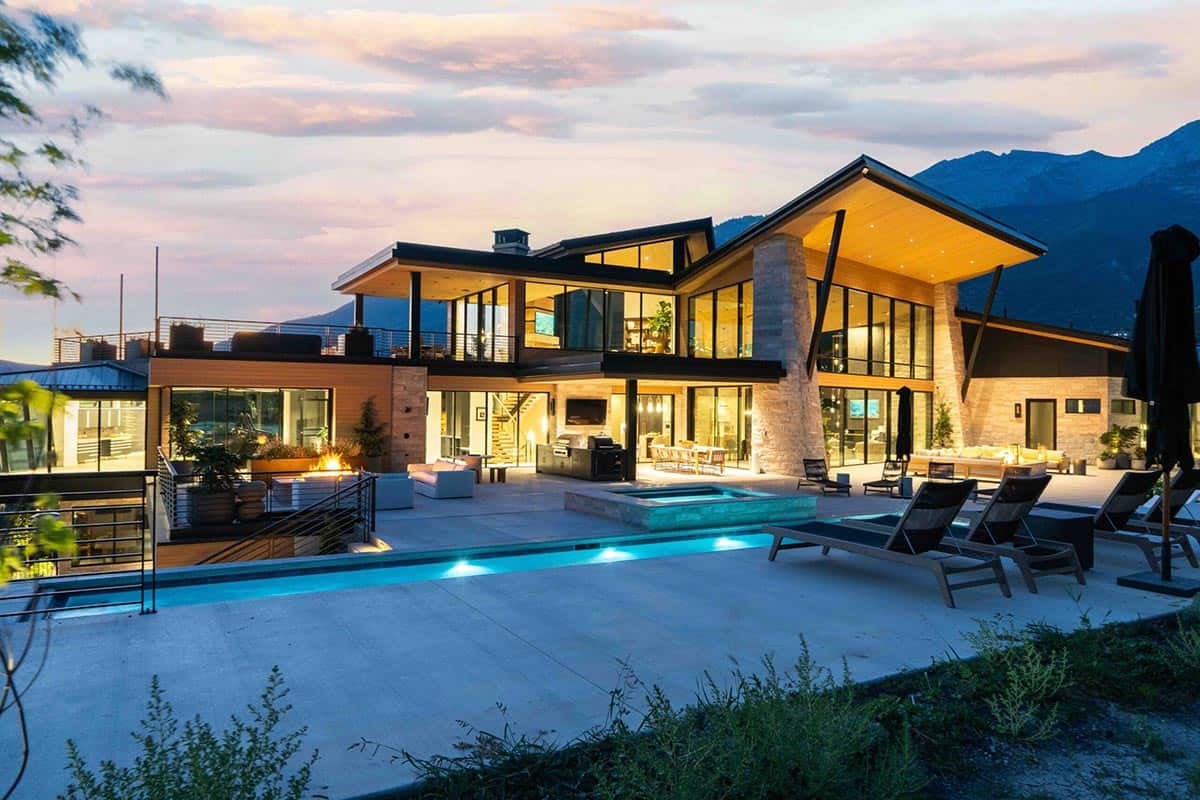 modern mountain house exterior at dusk