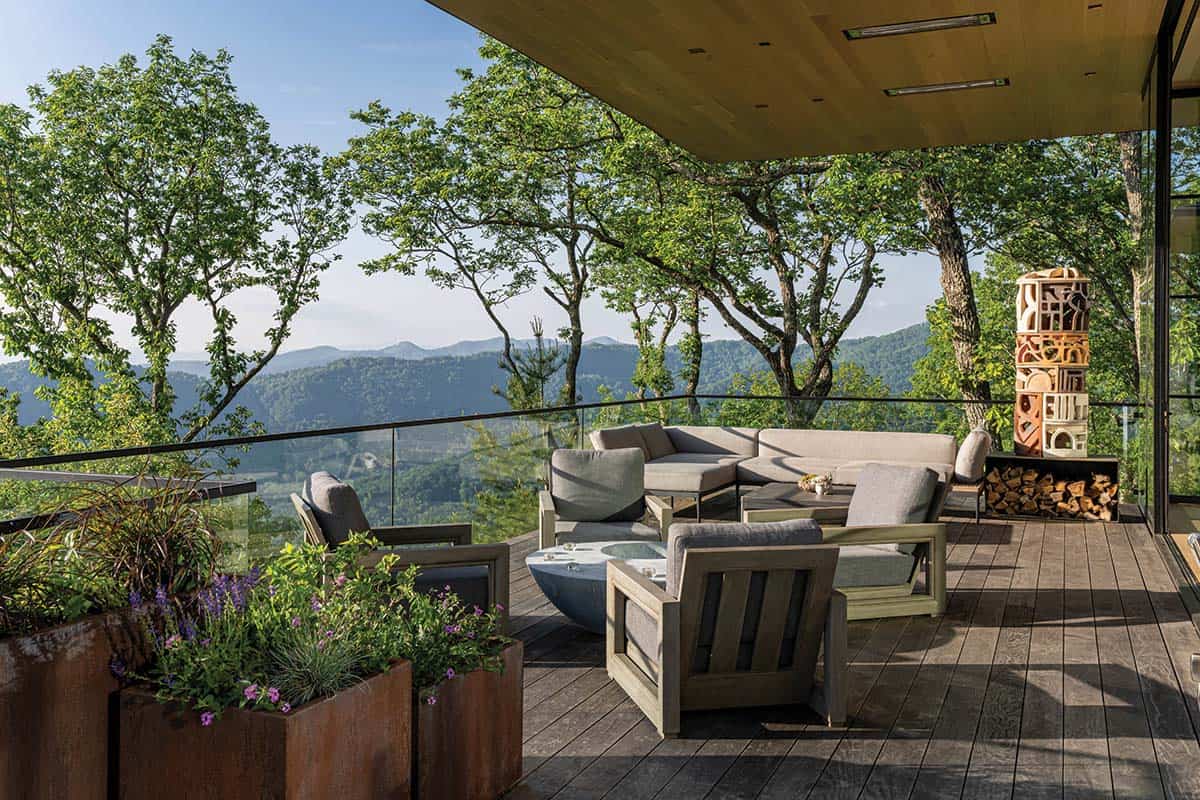 modern home exterior with a patio and outdoor furniture
