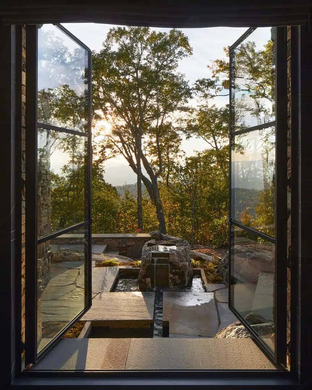 modern sliding glass doors with a water feature