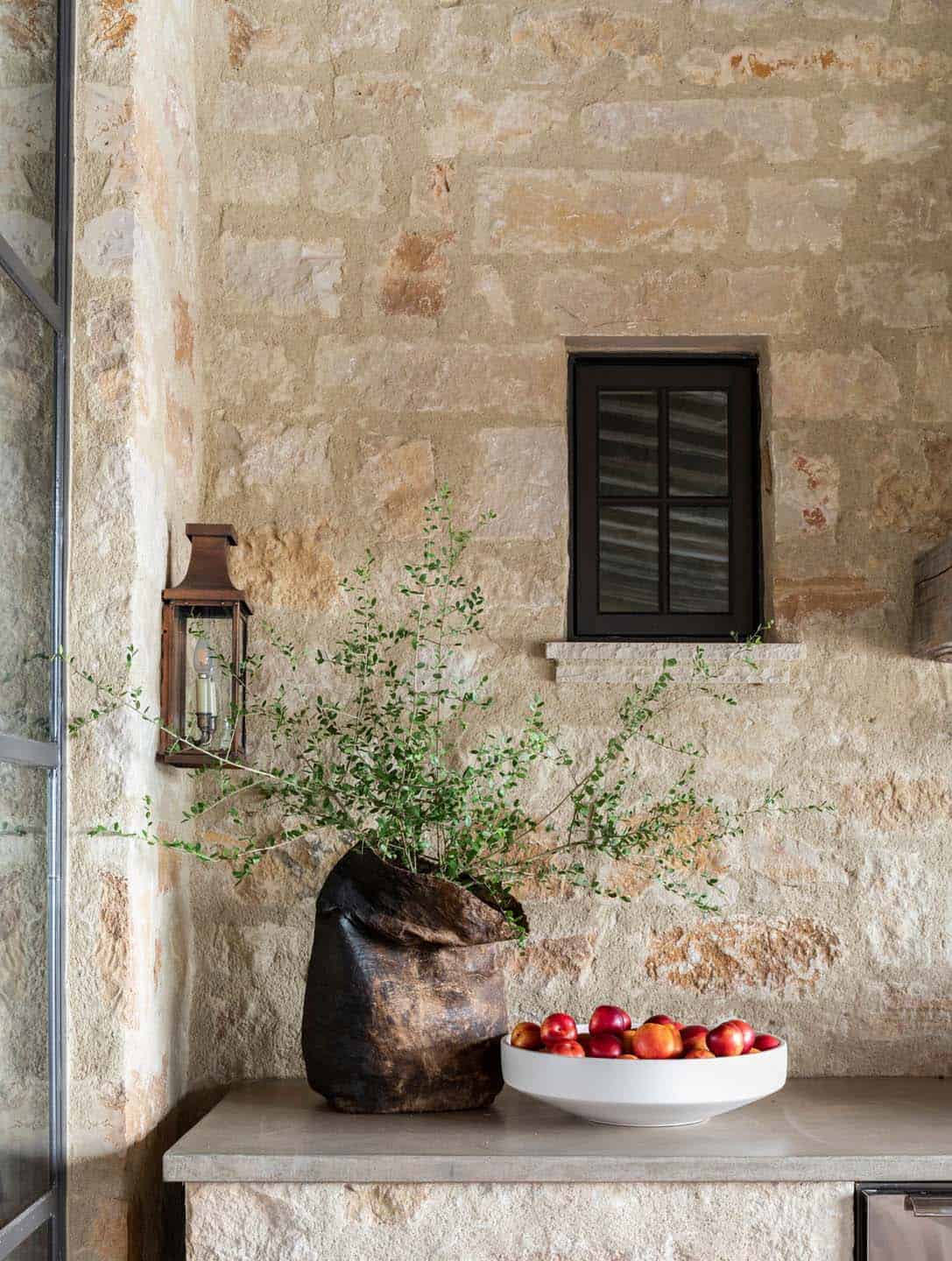 Mediterranean-style lake house exterior patio