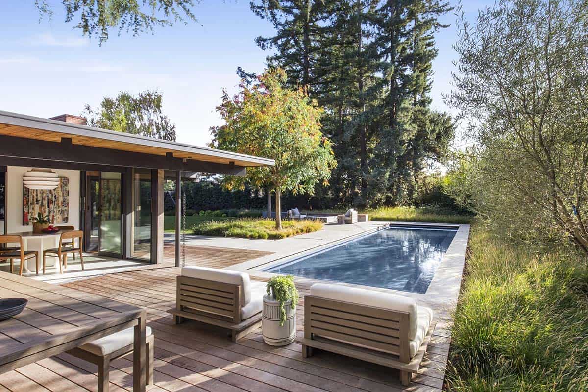 midcentury modern house exterior with a pool