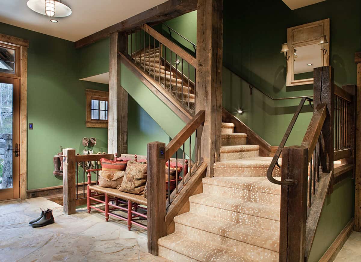 rustic mountain home entry with a staircase