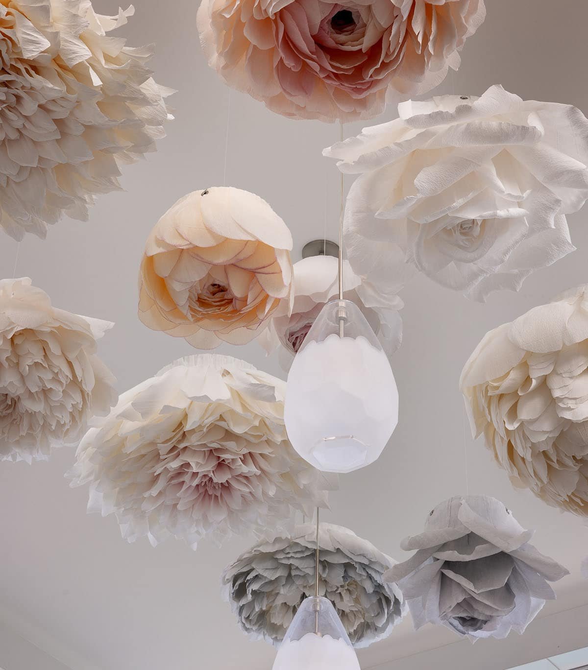 modern kids bunk bedroom with ceiling paper art flower pendants detail