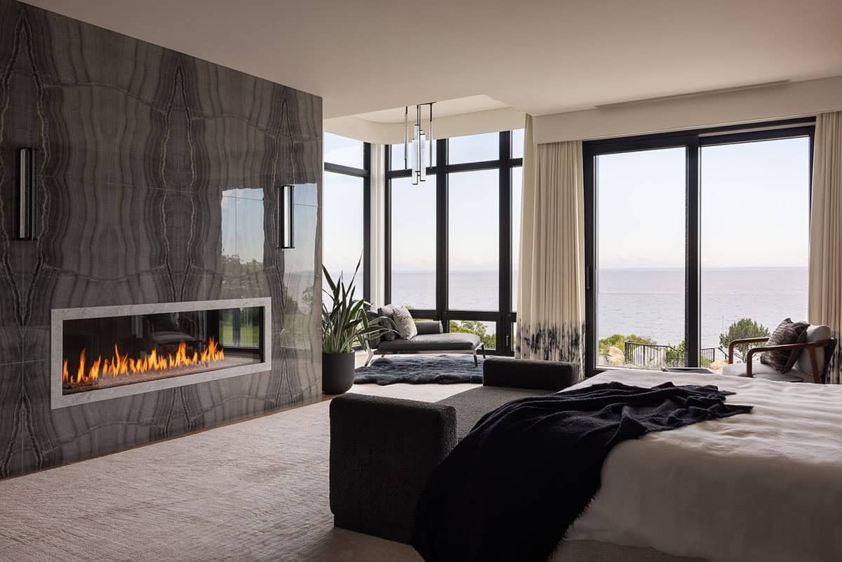 modern bedroom with a fireplace