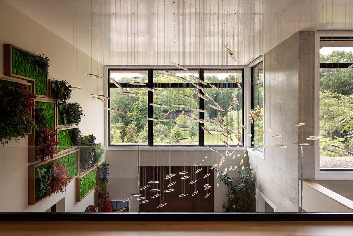 atrium living wall with sculptural lighting