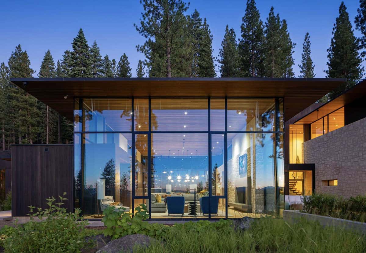 modern mountain house exterior at dusk