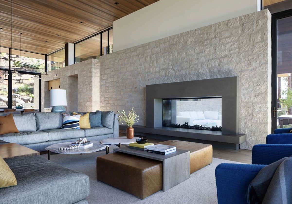 modern living room with a dual-sided fireplace
