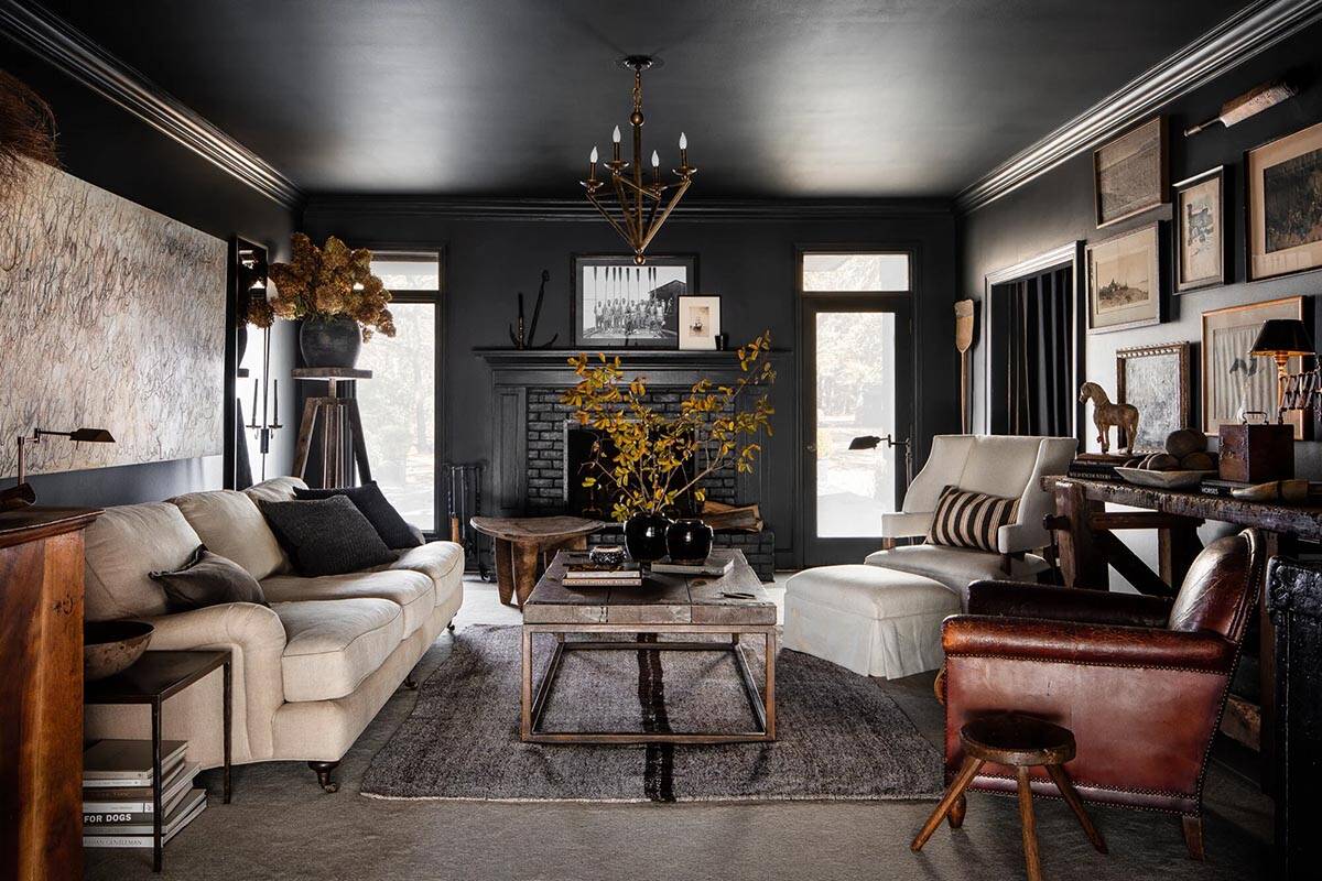 moody living room with a fireplace