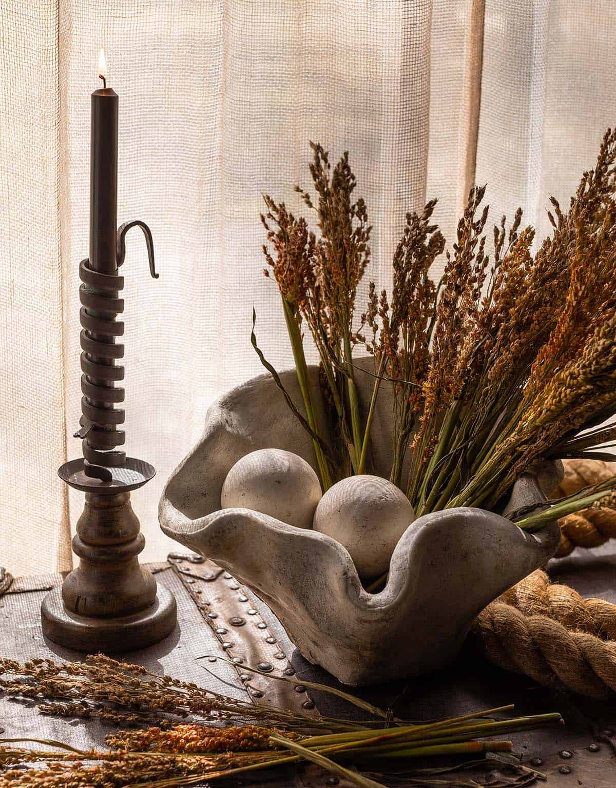 vignette of antiques decorating a table