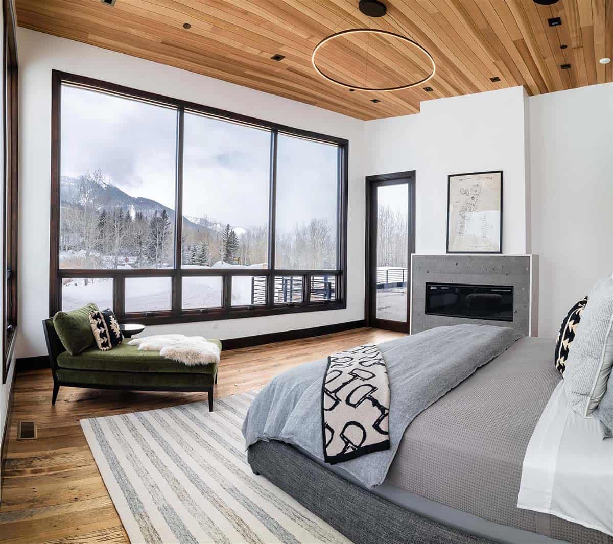 modern bedroom with large windows