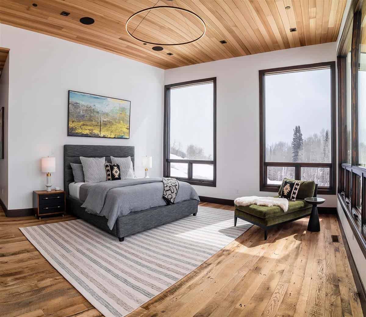 modern bedroom with large windows