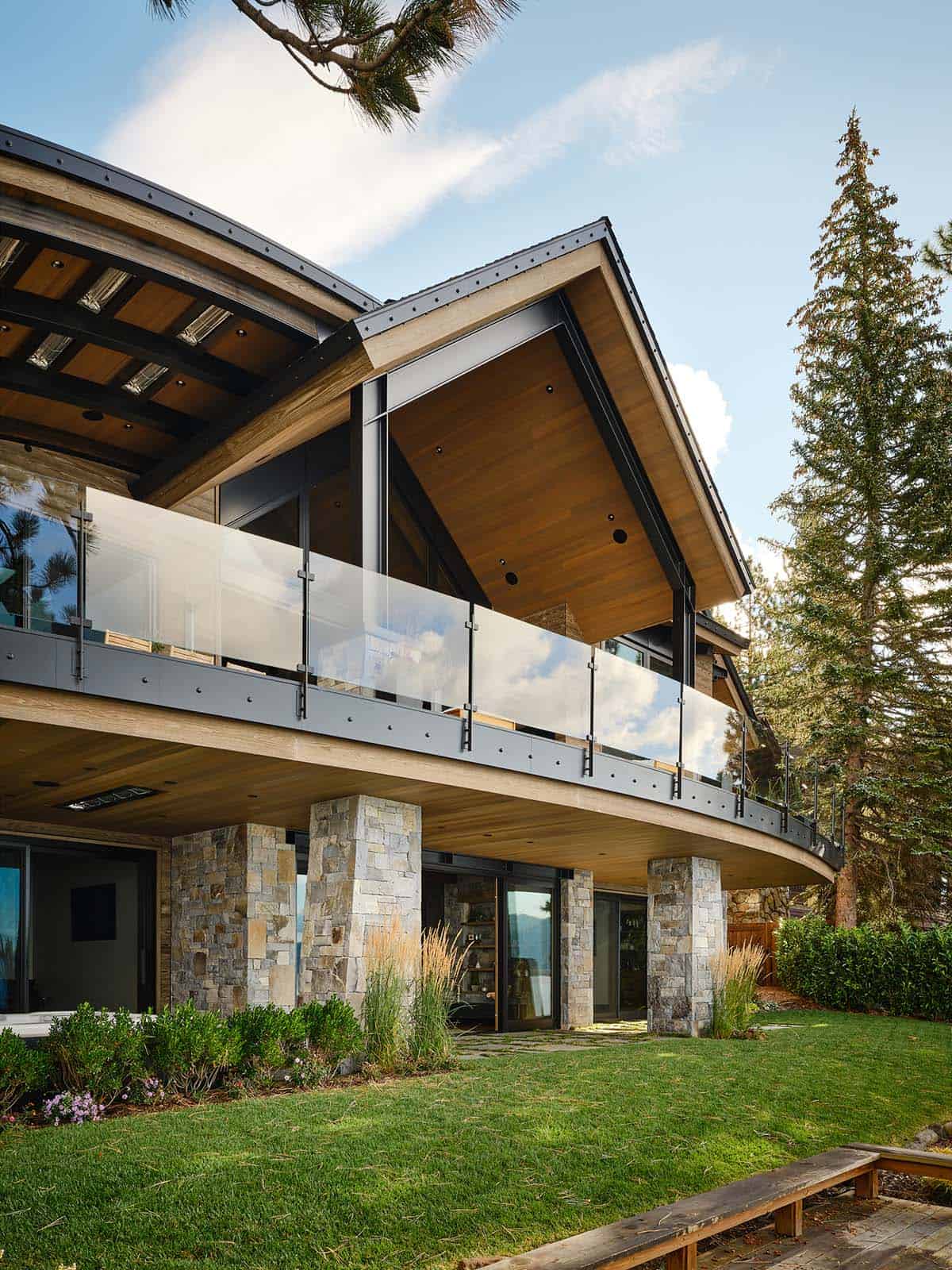 mountain modern lake house exterior backyard view
