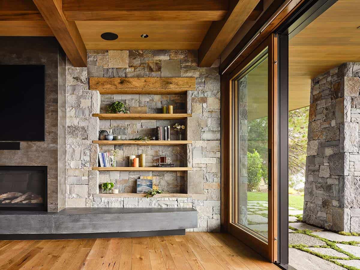 mountain modern family room with a fireplace