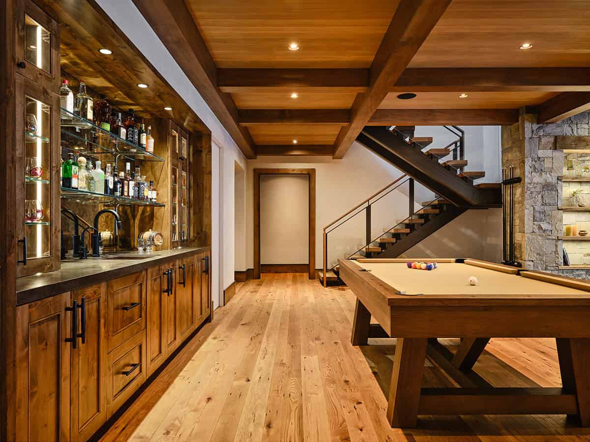 mountain modern game room with a wet bar