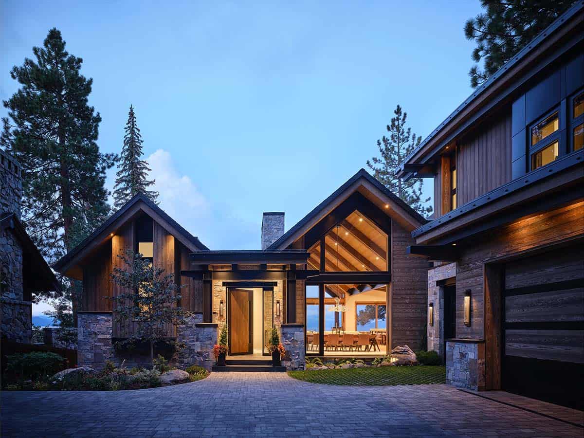 mountain modern lake house exterior at dusk