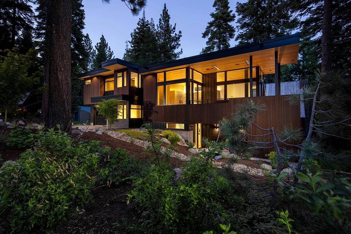 mountain modern home exterior at dusk