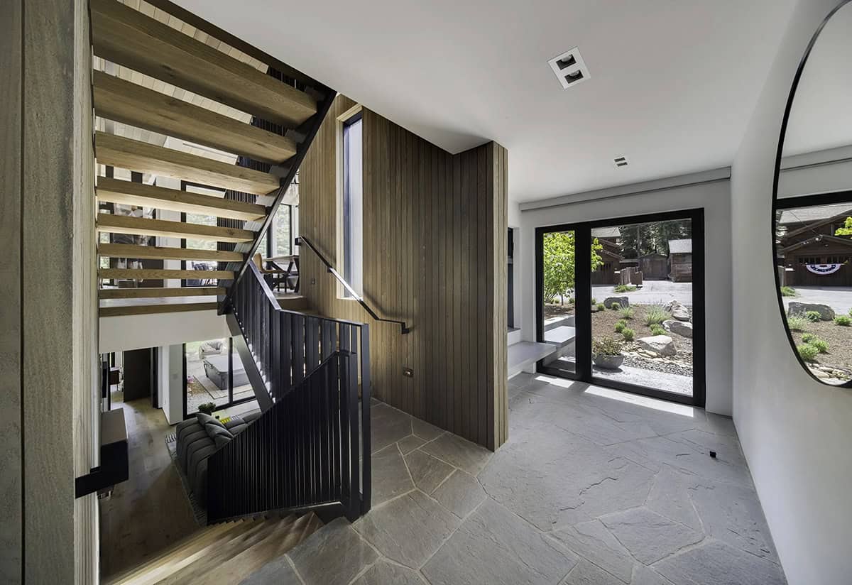 mountain modern home entry with a staircase
