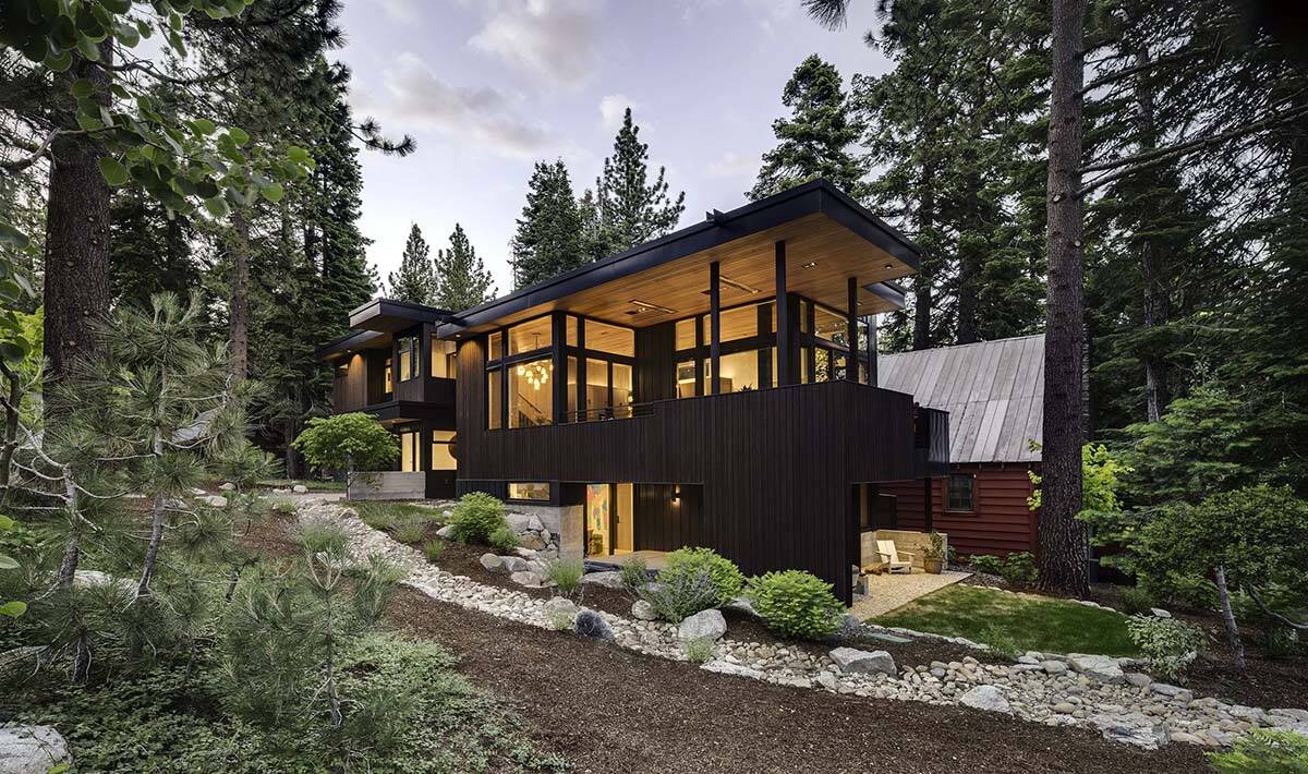mountain modern home exterior at dusk