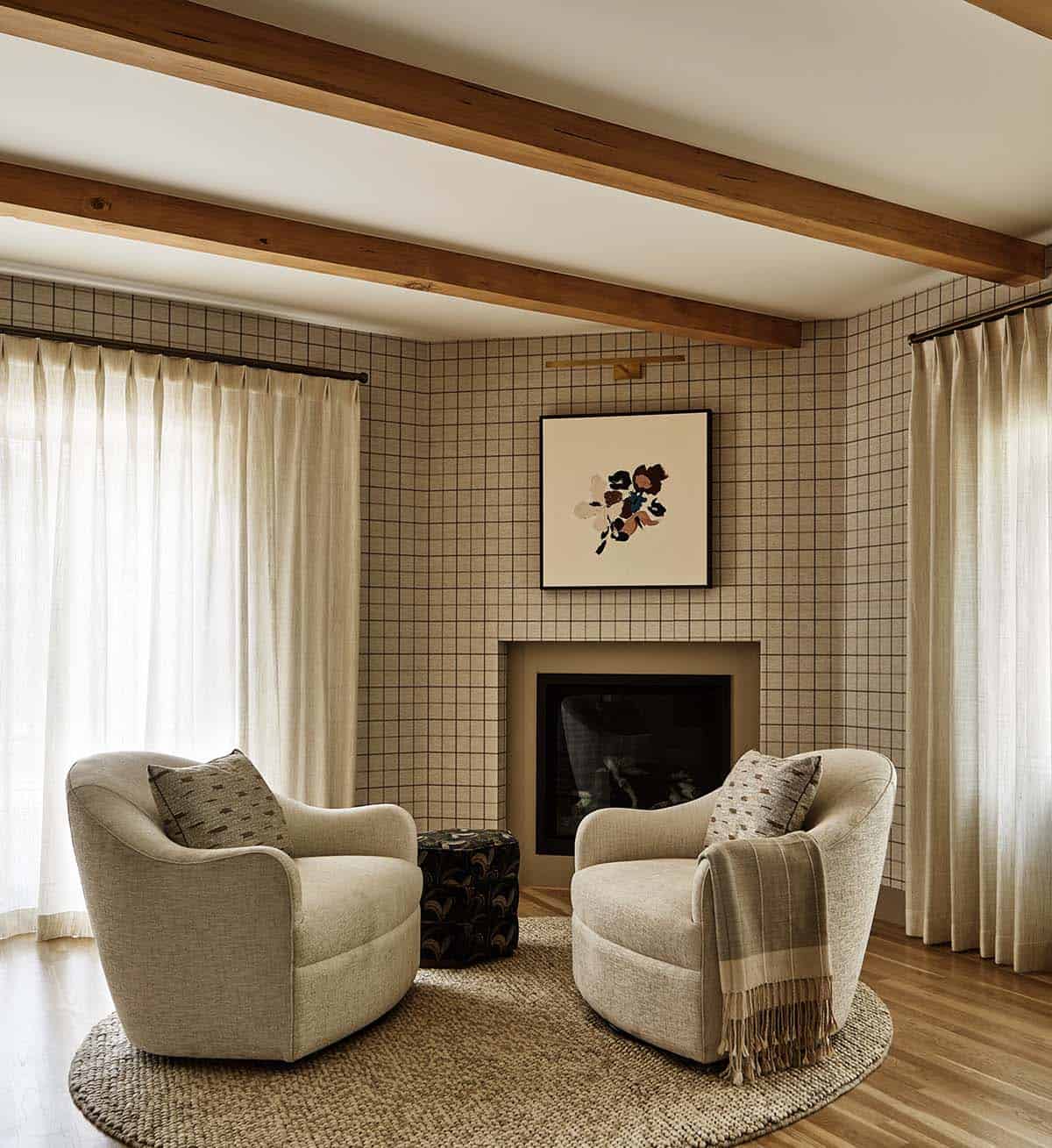 Rustic Bedroom sitting area with a fireplace