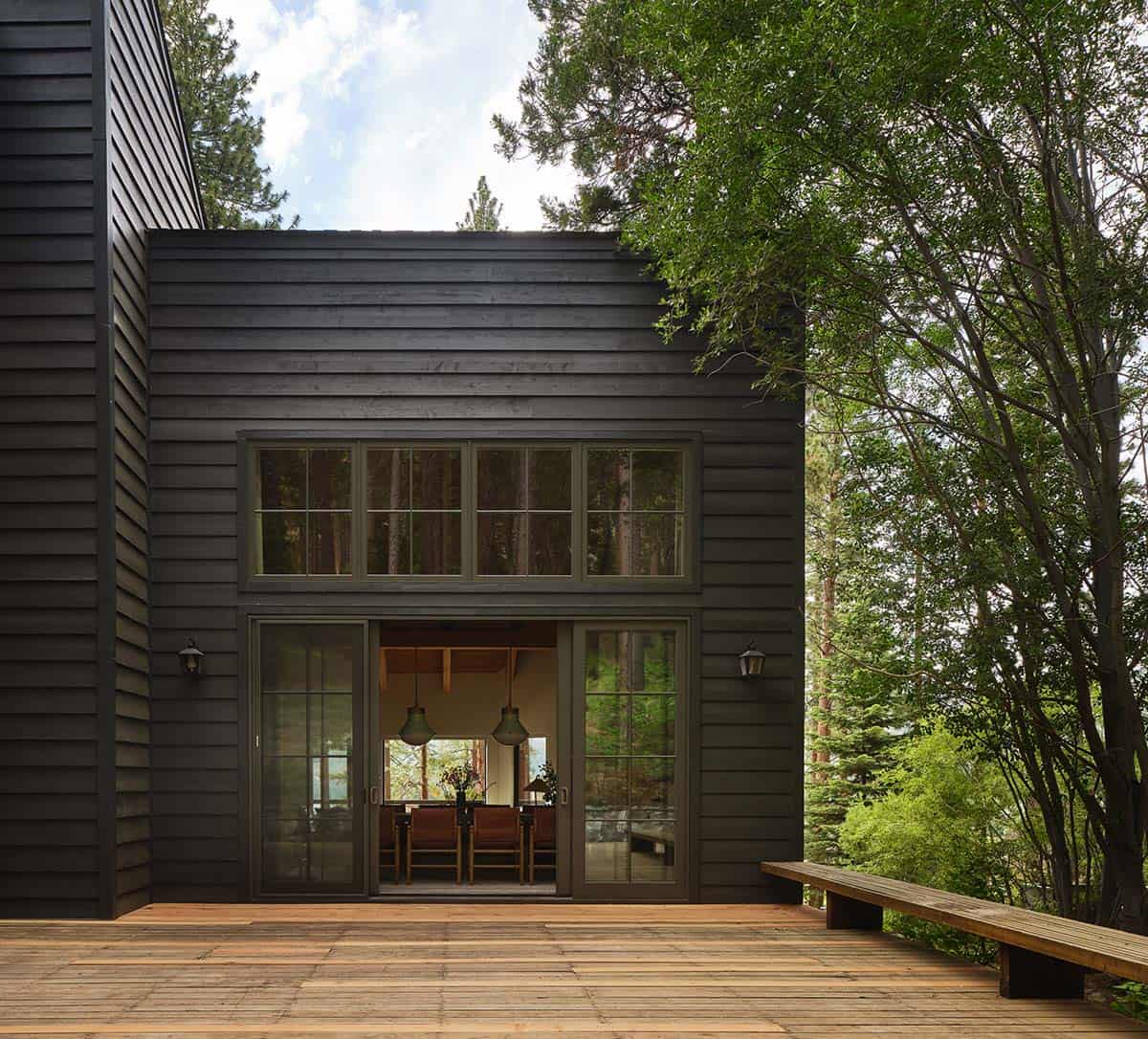 Modern Cabin Exterior with a Rustic Deck