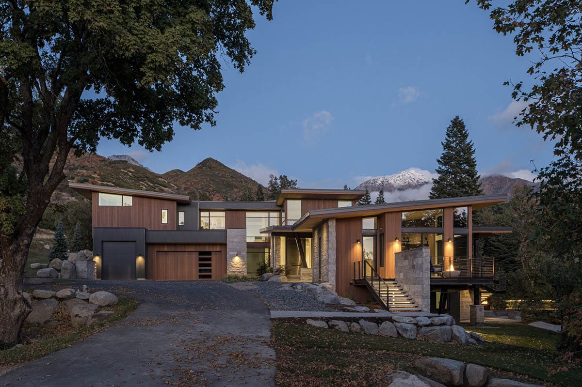 mountain modern home exterior at dusk