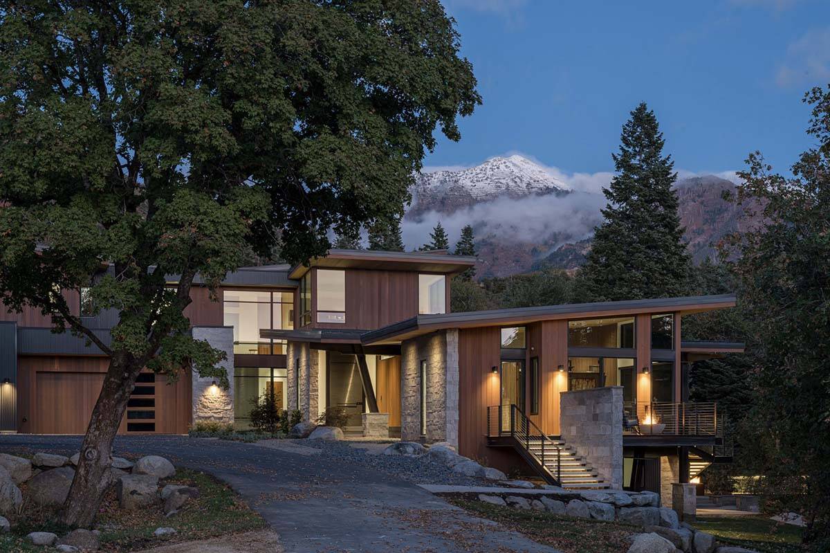 mountain modern home exterior at dusk
