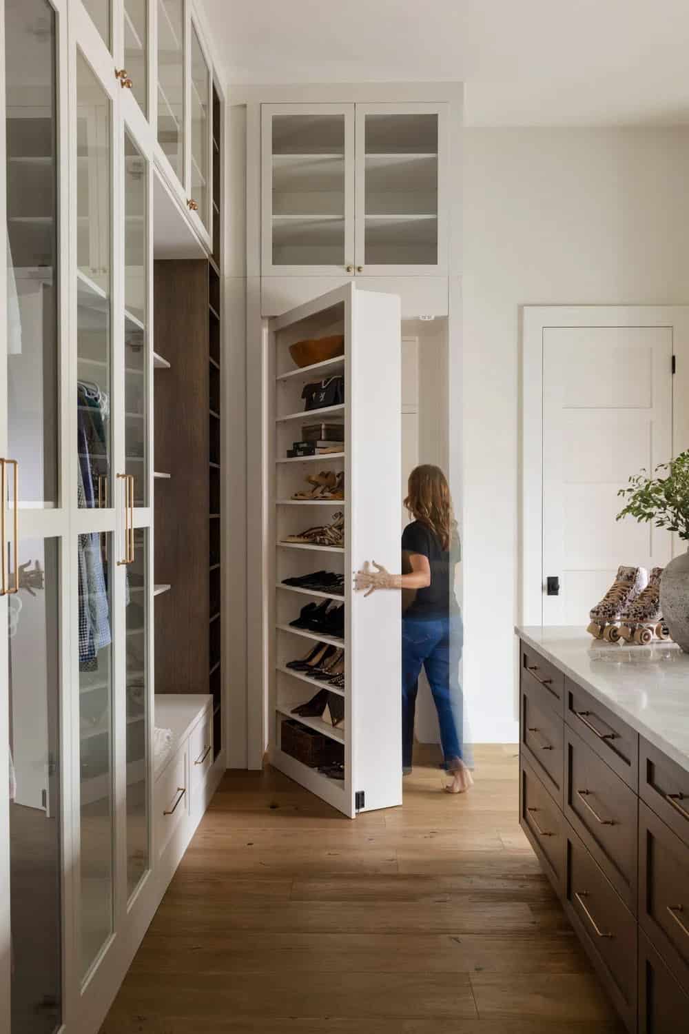 organic modern closet with a hidden door