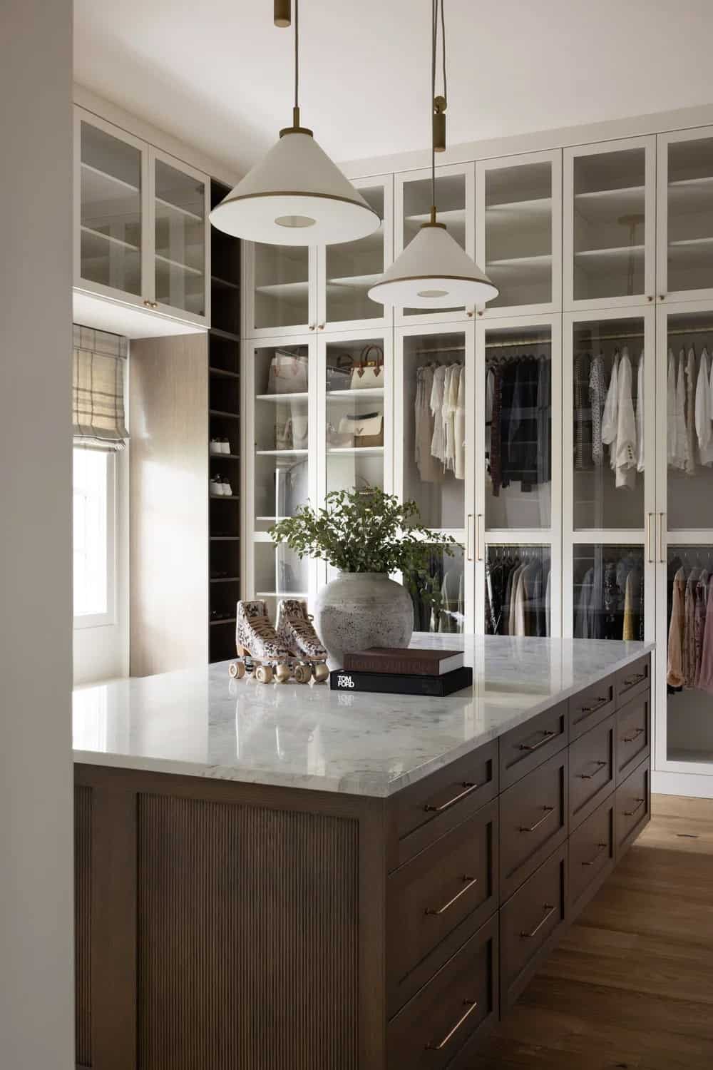 organic modern walk-in closet with an island