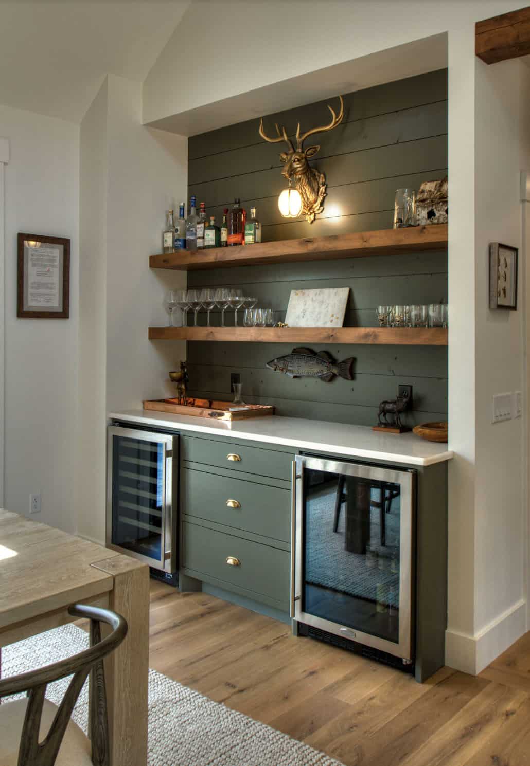 farmhouse style home bar with green cabinets