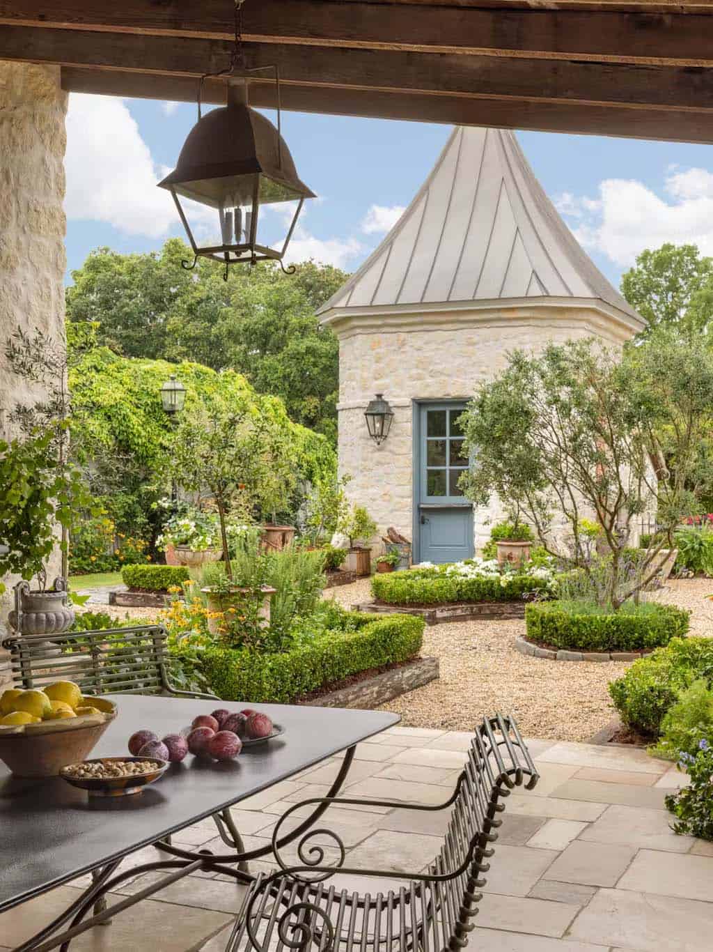 provencal-inspired home exterior with a patio and outdoor furniture
