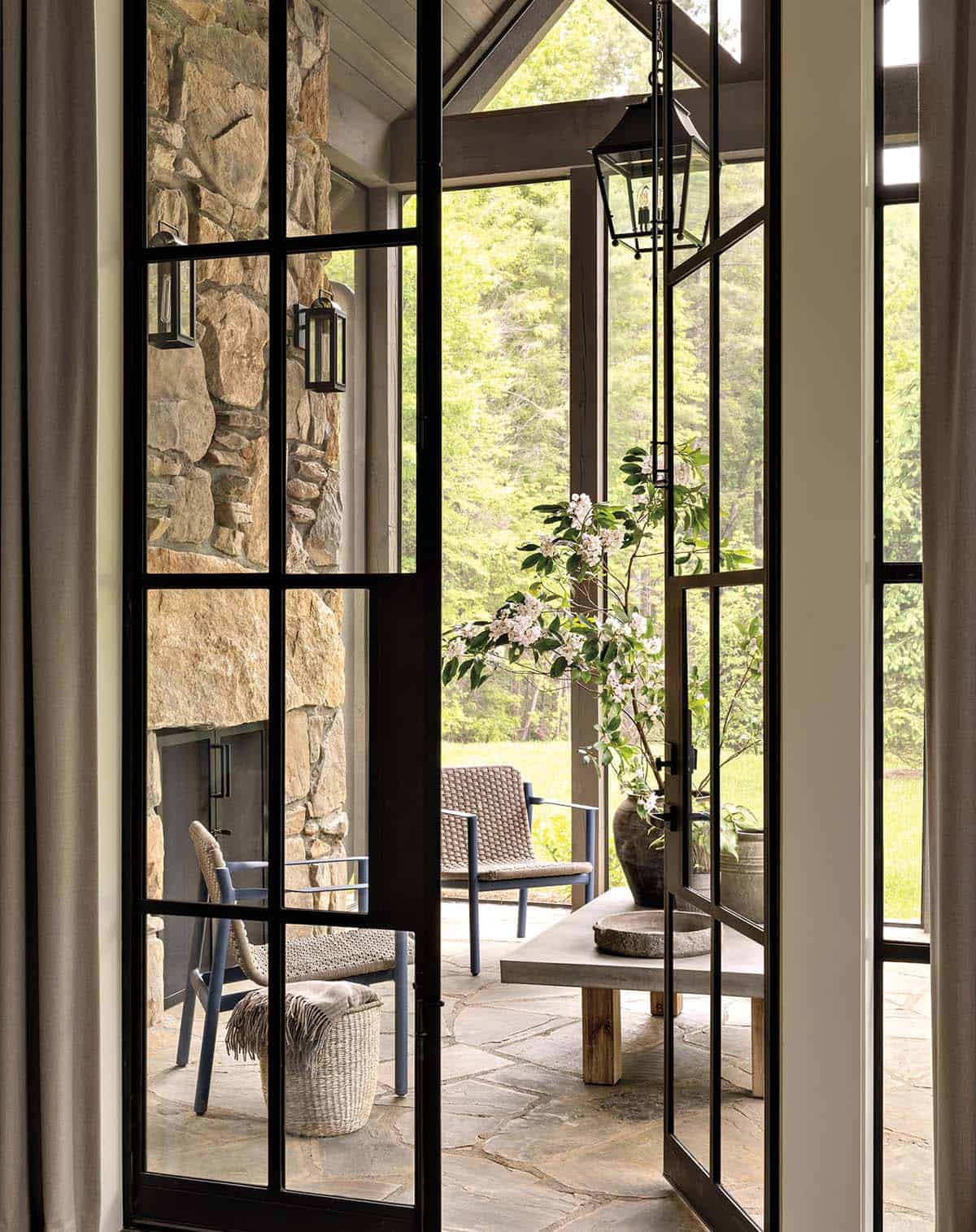 rustic modern french doors leading out to a covered patio