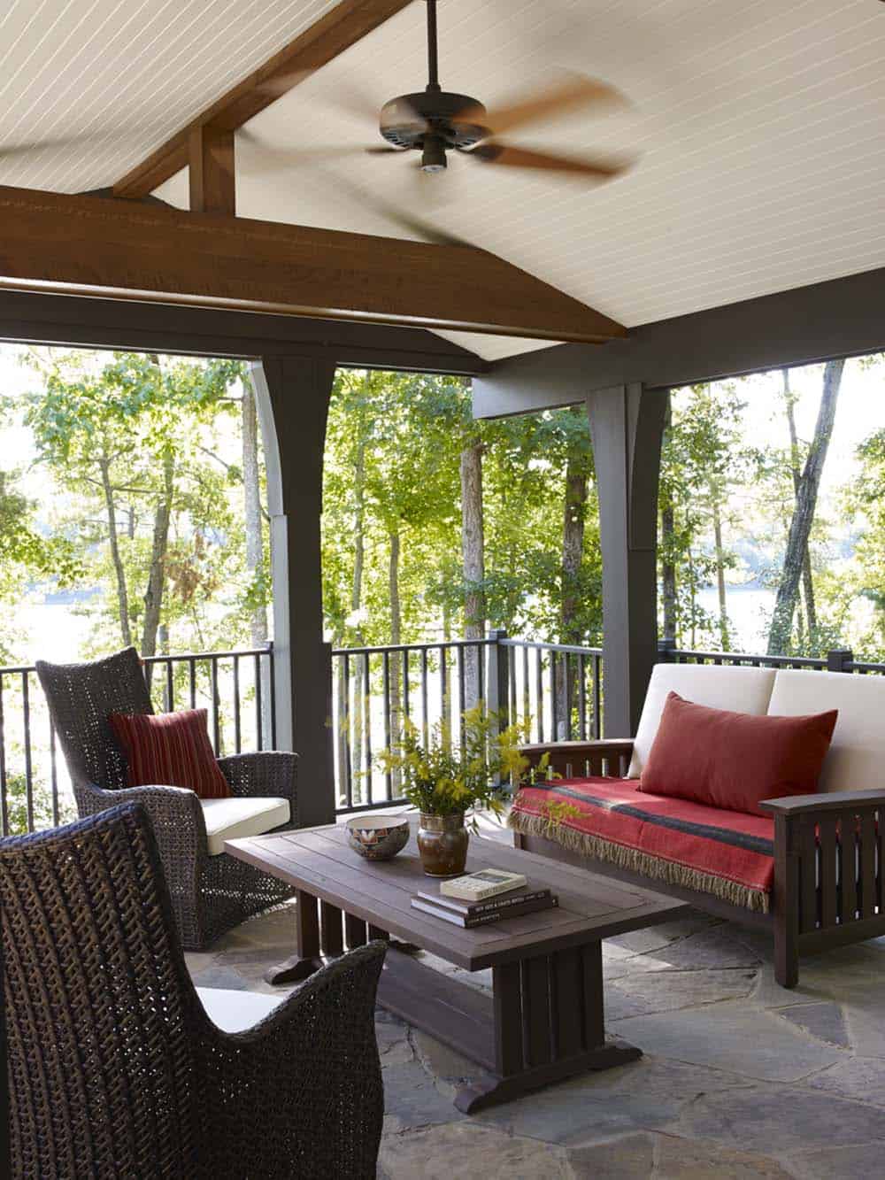 rustic covered porch with outdoor furniture