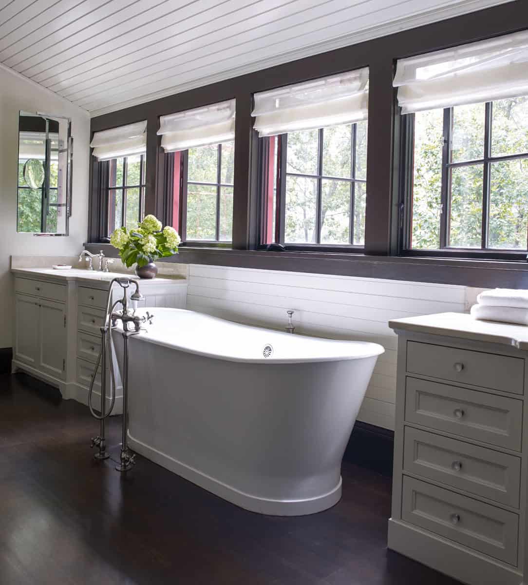 rustic bathroom with a freestanding tub