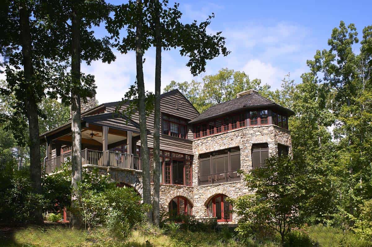 rustic craftsman-style lake house exterior backyard view