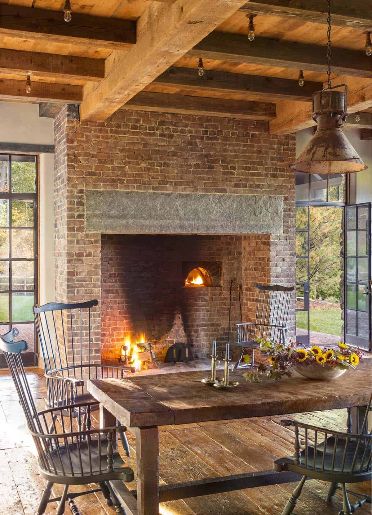 rustic dining room with a fireplace