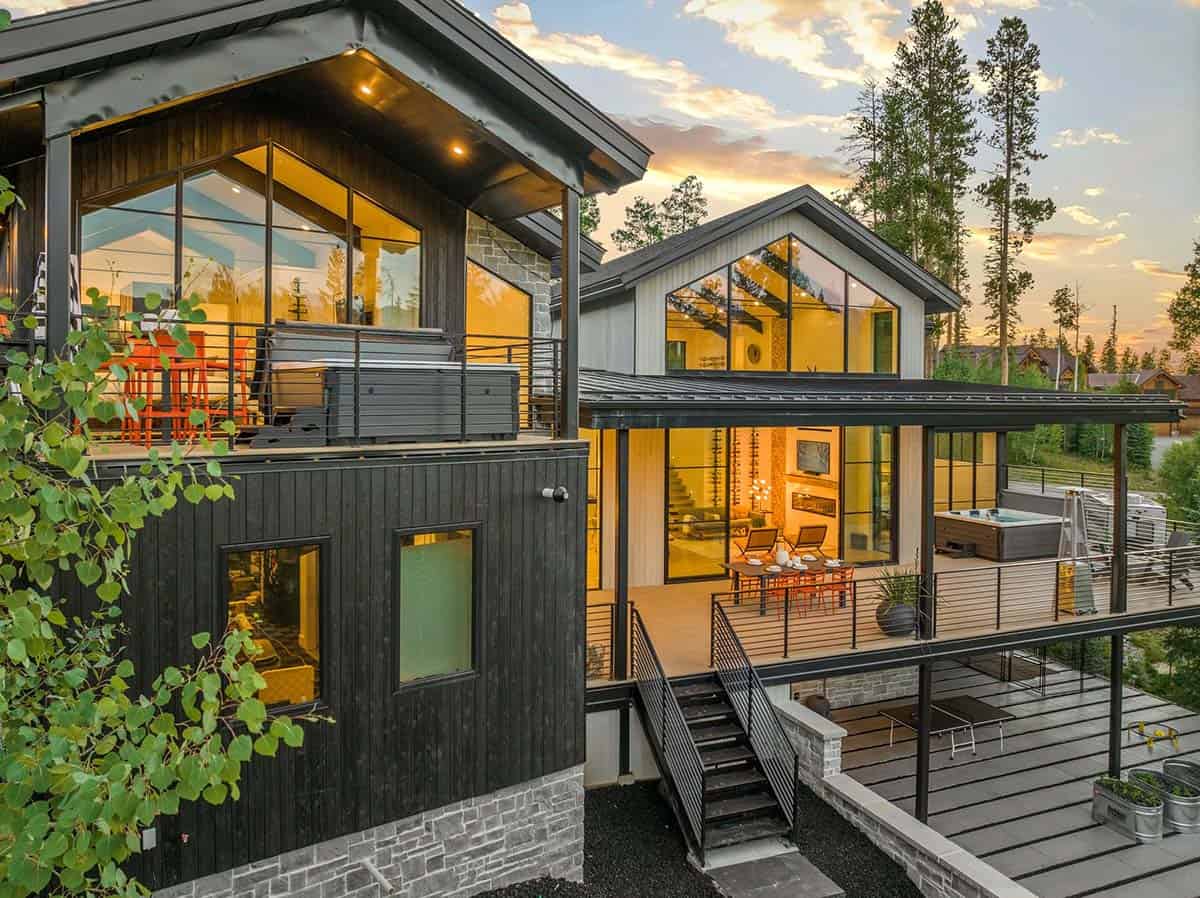 scandinavian mountain home exterior backyard view