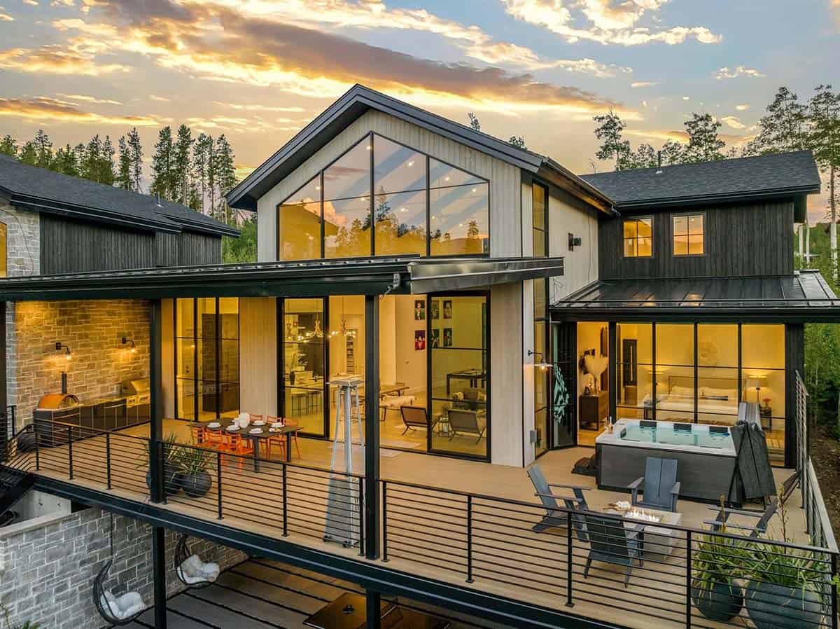 scandinavian mountain home exterior backyard view