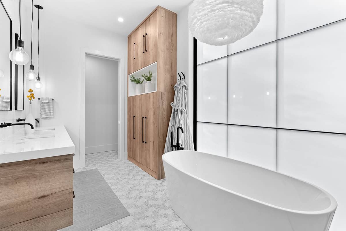 scandinavian modern bathroom with a freestanding tub