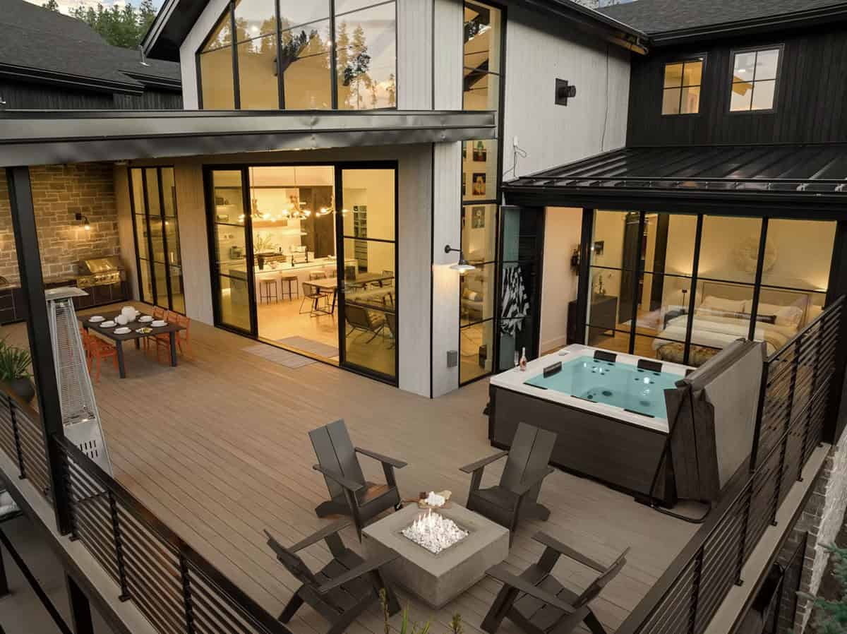 scandinavian mountain home exterior backyard view