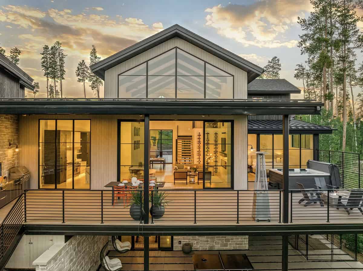scandinavian mountain home exterior backyard view